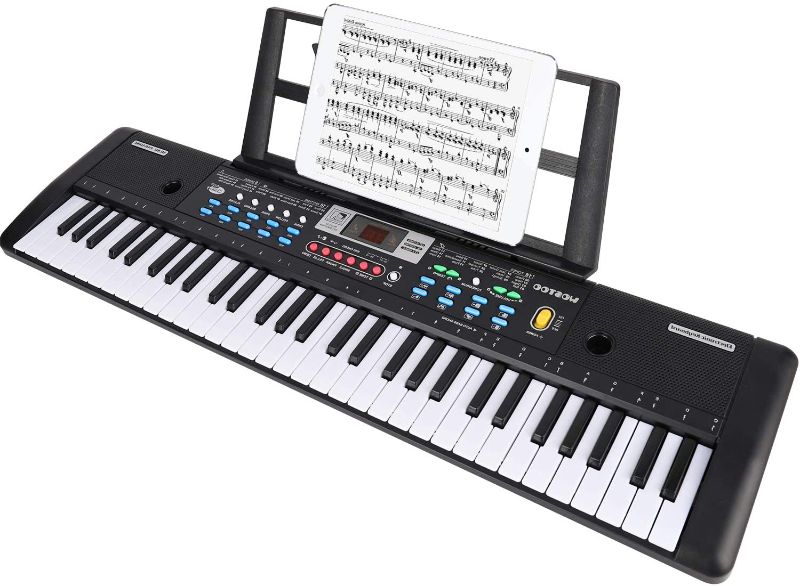 Photo 1 of WOSTOO Keyboard Piano, 61 Key Portable Keyboard with Built- In Speaker, Microphone, Piano Stand, Power Supply Teaching Toy Gift for Kids Boy Girl (32.3 x 9.1 x 3.5 inches)
