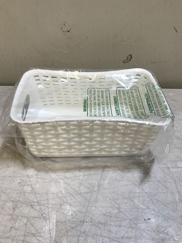 Photo 2 of YBM Home Plastic Rattan Weave Basket, Storage Bins Organizer for Closet, Shelf, Kitchen, Pantry and Bathroom - Ideal for Makeup, Cosmetics, Hair Supplies, and Clothes, (Small, White)
( SLIGHT BENDING ON SIDES ) 