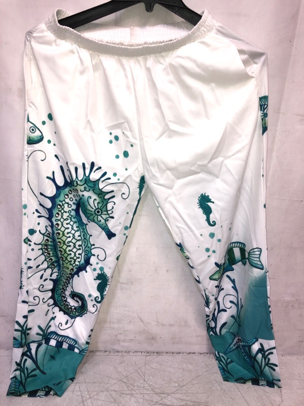 Photo 1 of WOMENS PANTS, WHITE AND GREEN, SIZE S/M