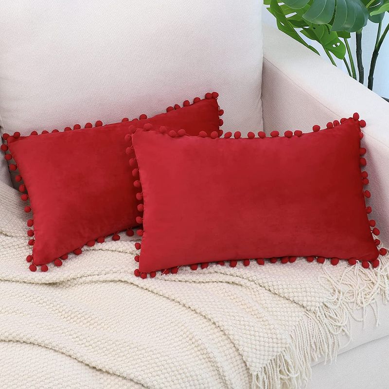 Photo 1 of BeBen Decorative Throw Pillow Covers with Pom Poms, Pack of 2 Soft Particles Velvet Pillow Cases Rectangle Cushion Covers for Couch Bedroom Car Sofa Outdoors 12x20 Red
