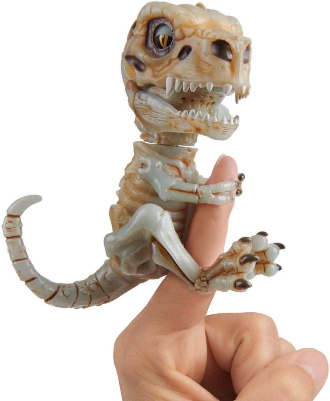 Photo 1 of WowWee Untamed Skeleton T-Rex by Fingerlings – Doom (Ash) – Interactive Collectible Dinosaur
