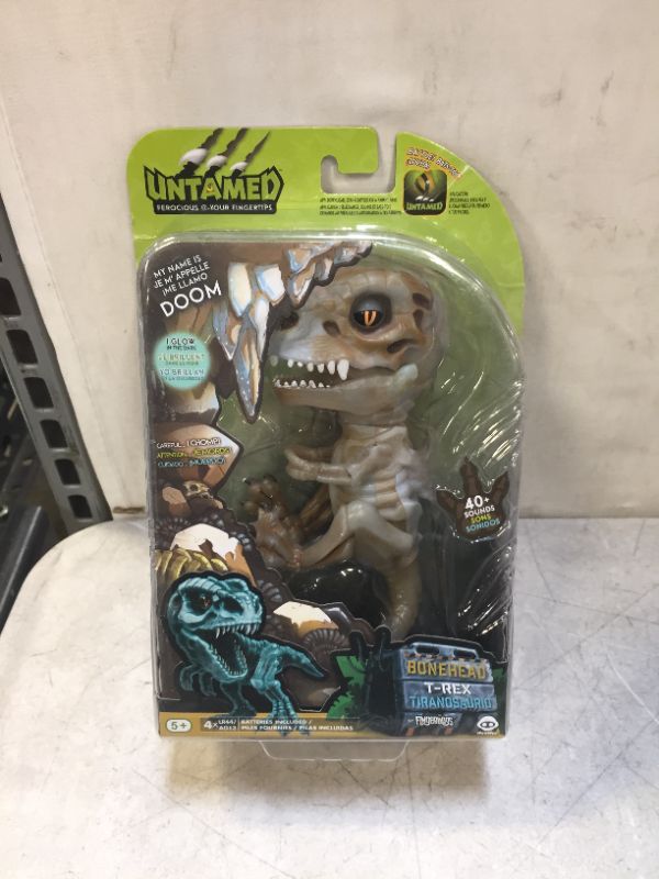 Photo 2 of WowWee Untamed Skeleton T-Rex by Fingerlings – Doom (Ash) – Interactive Collectible Dinosaur
