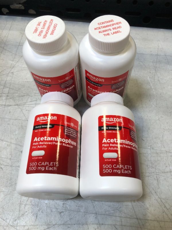 Photo 1 of Amazon Basic Care Extra Strength Pain Relief, Acetaminophen Caplets, 500 mg, 500 Count each bottle  4 pack EXP NOV 2022 ---