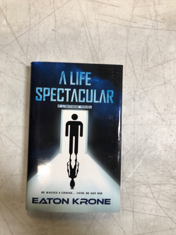 Photo 2 of A Life Spectacular: A LightSide Novel Hardcover – April 1, 2021