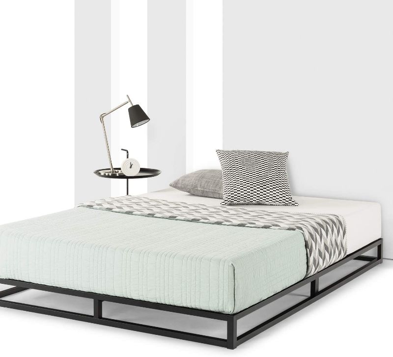 Photo 1 of Mellow Low Profile 6/10" Metal Platform Bed Frame Type with Classic Wooden Slat
end of box is ripped open 
