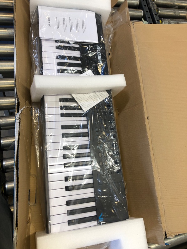 Photo 2 of Alesis VI49 - 49 Key USB MIDI Keyboard Controller with, 16 Drum Pads, 12 Assignable Knobs, 36 Buttons and 5-Pin MIDI Out, Production Software Included