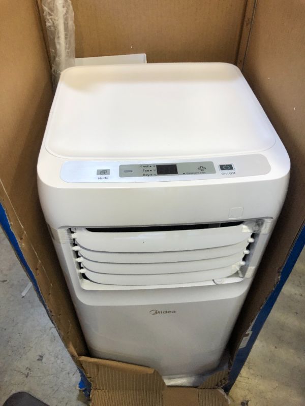 Photo 1 of Midea 8,000 BTU DOE (5,300 BTU SACC) Portable Air Conditioner, Cools up to 175 Sq. Ft., Works as Dehumidifier & Fan, Remote Control & Window Kit Included