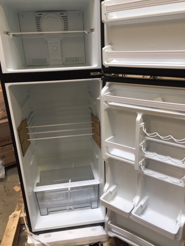 Photo 6 of Galanz 12 Cu Ft Top Freezer Refrigerator, Frost Free, Stainless Look
FACTORY WRAPPED PRIOR TO PICTURES 
ON ONE SIDE THERE IS 2 DENTS BUT THEY DO NOT EFFECT FUNCTION 