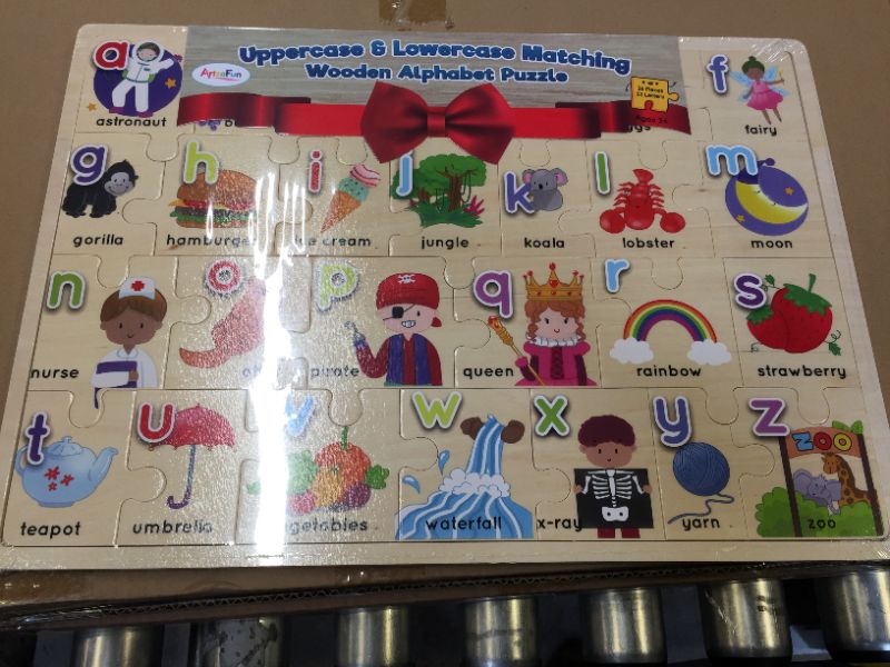 Photo 1 of alphabet wooden puzzle toy