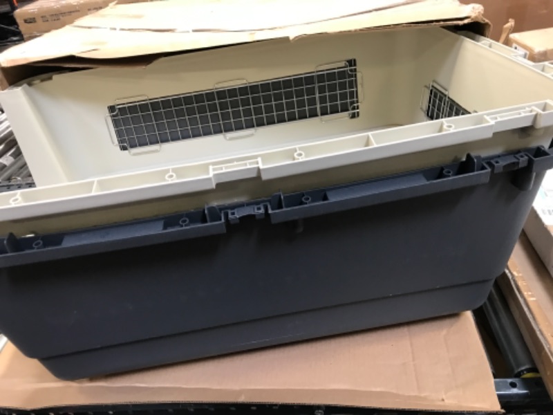 Photo 1 of SportPet Designs Plastic Kennels Rolling Plastic Wire Door Travel Dog Crate