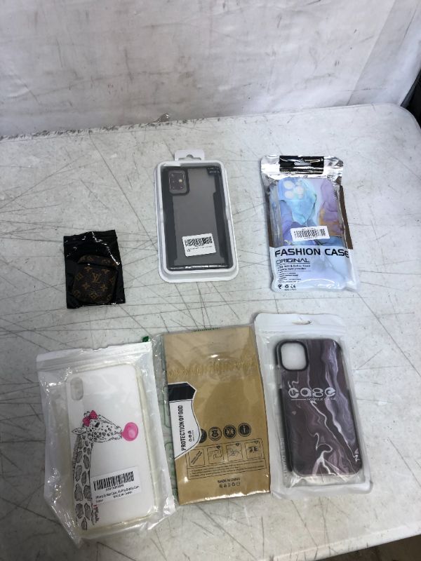 Photo 1 of miscellaneous bundled phone cases and screen protectors sold as is