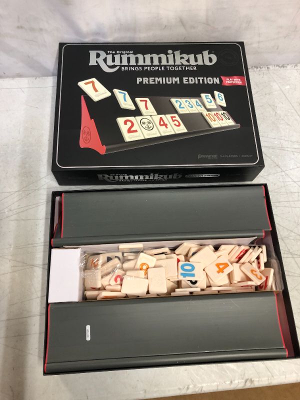 Photo 2 of Rummikub Premium Edition by Pressman - Features Racks - Large Number Engraved Tiles and a Storage Bag for The Ultimate Rummikub Experience by Pressman , Silver