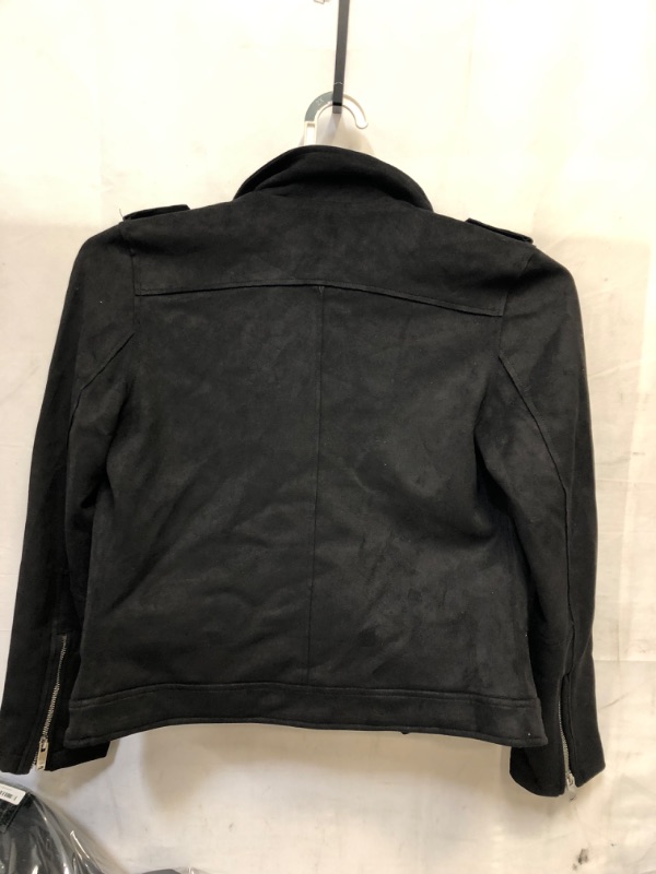 Photo 1 of jacket womens black size small has a smell needs to be wahsed 