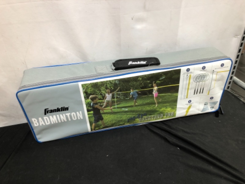 Photo 2 of Franklin Sports Badminton Net Sets - Outdoor Backyard + Beach Badminton Net + Equipment Set - (4) Rackets + (2) Birdies + Portable Net Included - Adults + Kids Set
