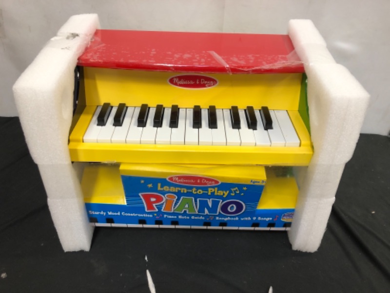 Photo 4 of Melissa & Doug Learn-To-Play Piano With 25 Keys and Color-Coded Songbook
