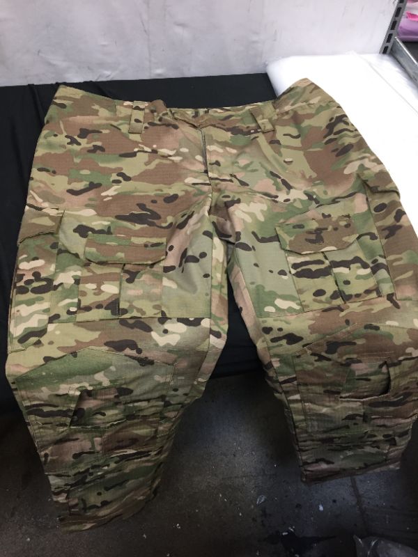 Photo 1 of CAMO CARGO PANTS SIZE MEDIUM/LARGE