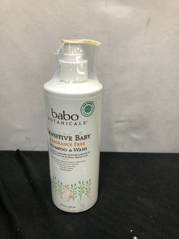 Photo 2 of Babo Botanicals Sensitive Baby 2-in-1 Shampoo & Wash - with Organic Calendula, Oatmilk, Shea & Cocoa Butter - Fragrance-Free & EWG Verified - 16 fl. oz. (Packaging May Vary) --- product was lesked on but in new condition 