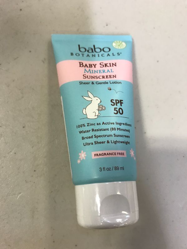Photo 3 of Babo Botanicals Baby Skin Mineral Sunscreen Lotion SPF 50 Broad Spectrum - with 100% Zinc Oxide Active – Fragrance-Free, Water-Resistant, Ultra-Sheer & Lightweight - 3 fl. oz. STICKER ON BACK OF BOTTLE COVERING FACTS
