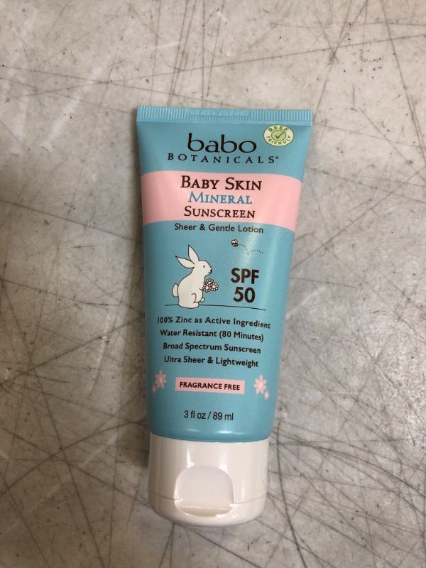 Photo 2 of Babo Botanicals Baby Skin Mineral Sunscreen Lotion SPF 50 Broad Spectrum - with 100% Zinc Oxide Active – Fragrance-Free, Water-Resistant, Ultra-Sheer & Lightweight - 3 fl. oz. STICKER ON BOTTLE COVERING FACTS
