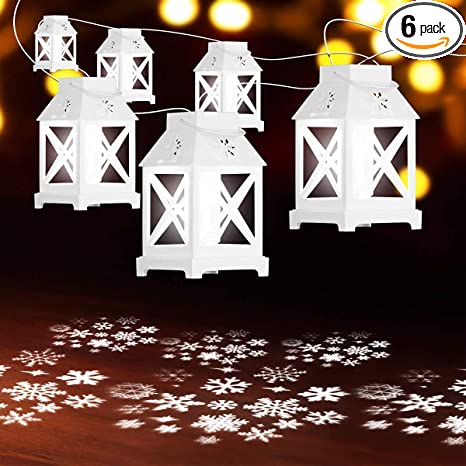 Photo 1 of YUNLIGHTS Christmas String Lights - 22.6 Ft Snowflake Projector Lights with 6Pcs LED Lantern Projection- Plug in Hanging Lights for Indoor Outdoor Patio Porch Bedroom Party Christmas Decorations
