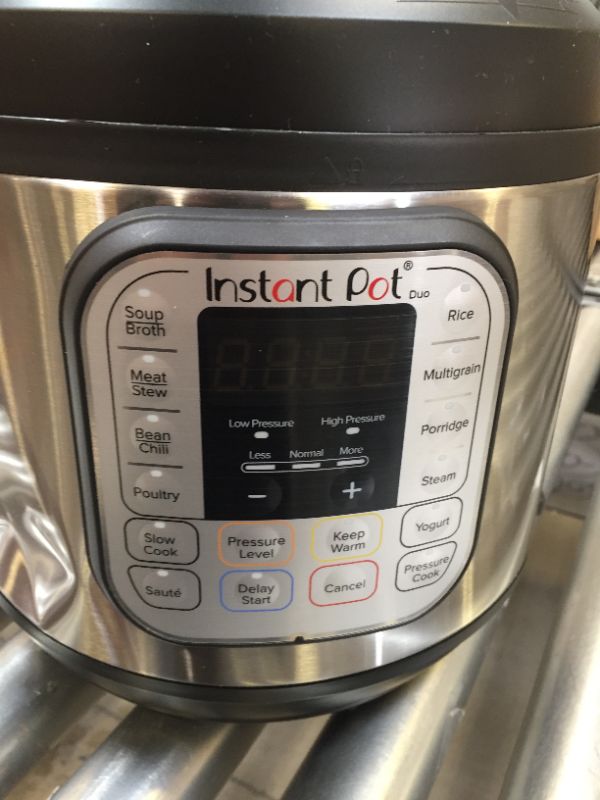 Photo 2 of Instant Pot Duo 7-in-1 Electric Pressure Cooker, Slow Cooker, Rice Cooker, Steamer, Sauté, Yogurt Maker, Warmer & Sterilizer, 6 Quart, Stainless Steel/Black
DENTED