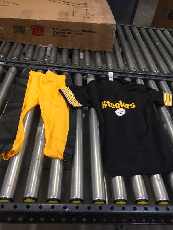 Photo 1 of football jersey,pants and helmet ;medium kids 