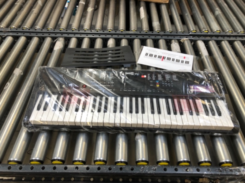 Photo 2 of RockJam 61 Portable Electronic Keyboard with Key Note Stickers, Power Supply and Simply Piano App Content, Compact (RJ361)
