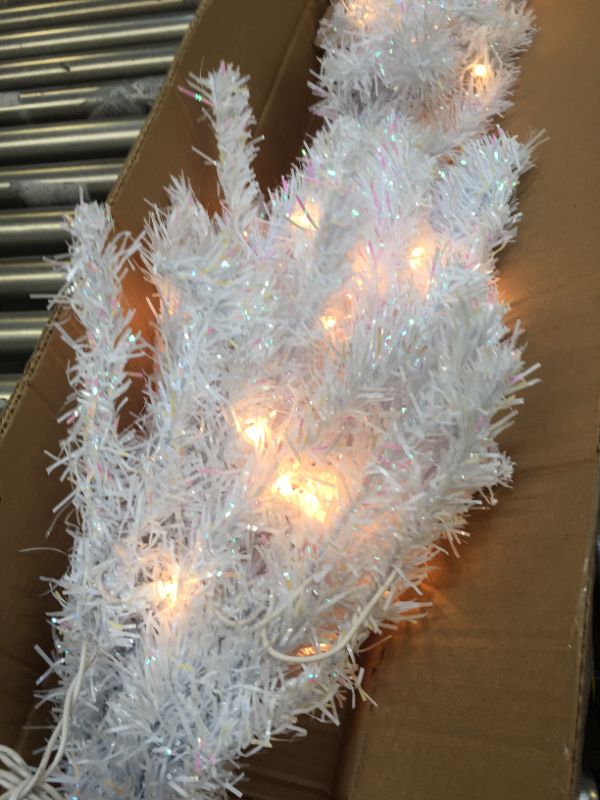 Photo 5 of National Tree Company Pre-Lit Artificial Christmas Tree, White Tinsel, White Lights, Includes Stand, 4 feet
