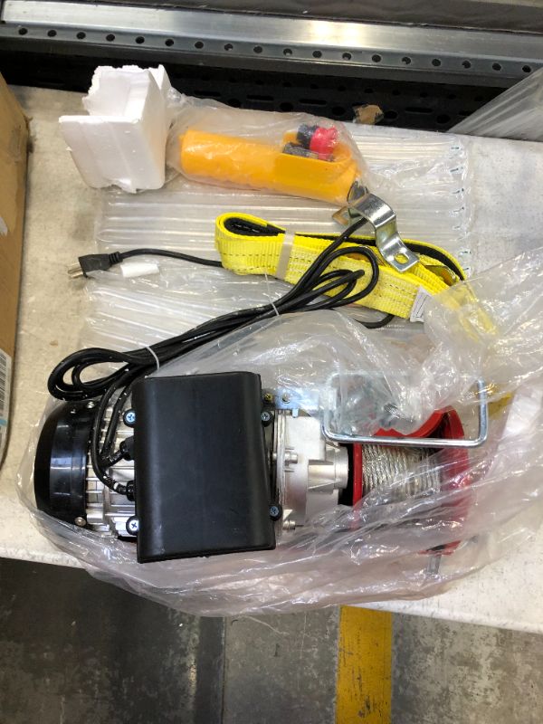 Photo 2 of VEVOR Electric Hoist, 1320LBS Electric Winch, Steel Electric Lift, 110V Electric Hoist with Remote Control & Single/Double Slings for Lifting in Factories, Warehouses, Construction Site, Mine Filed
