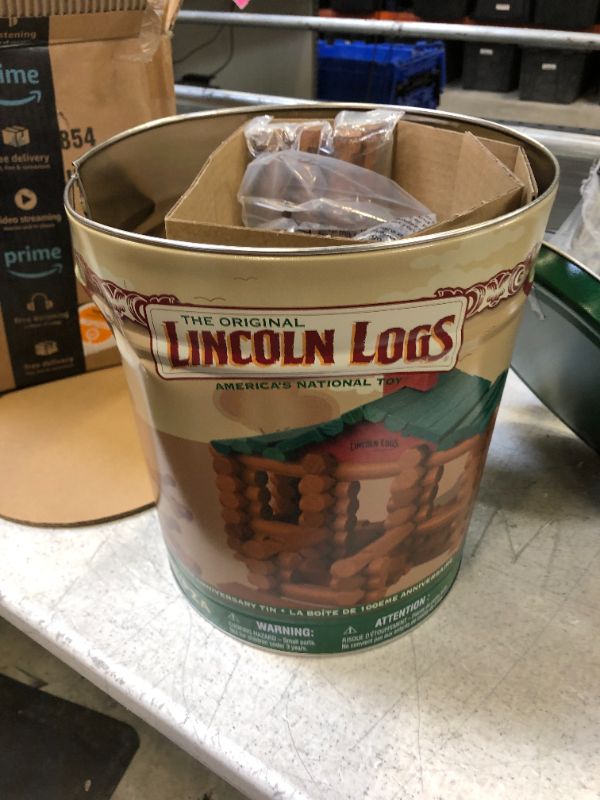 Photo 2 of Lincoln Logs –100th Anniversary Tin-111 Pieces-Real Wood Logs-Ages 3+ - Best Retro Building Gift Set for Boys/Girls - Creative Construction Engineering – Top Blocks Game Kit - Preschool Education Toy, Brown (854)
