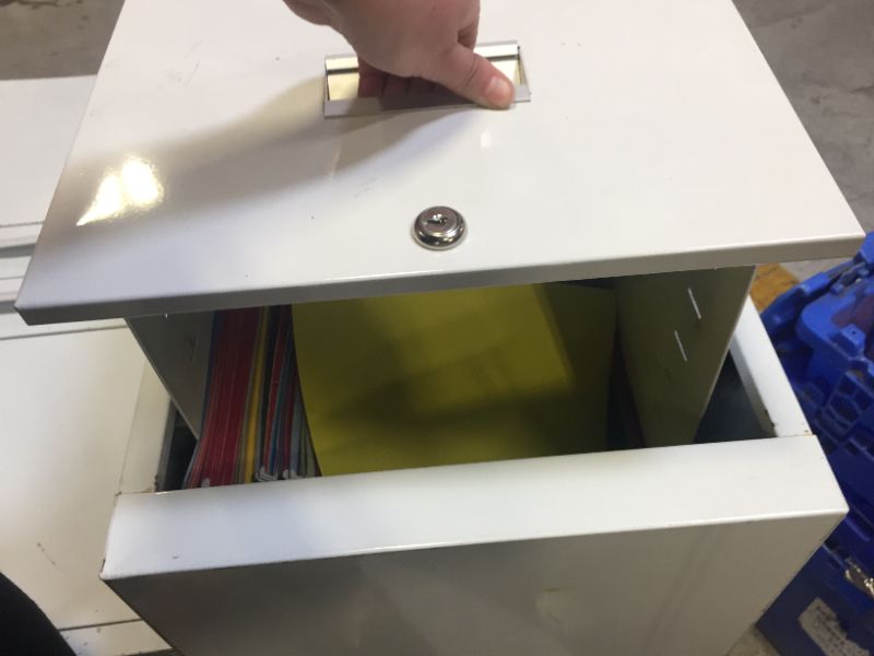 Photo 1 of 2 WHITE FILE CABINET
