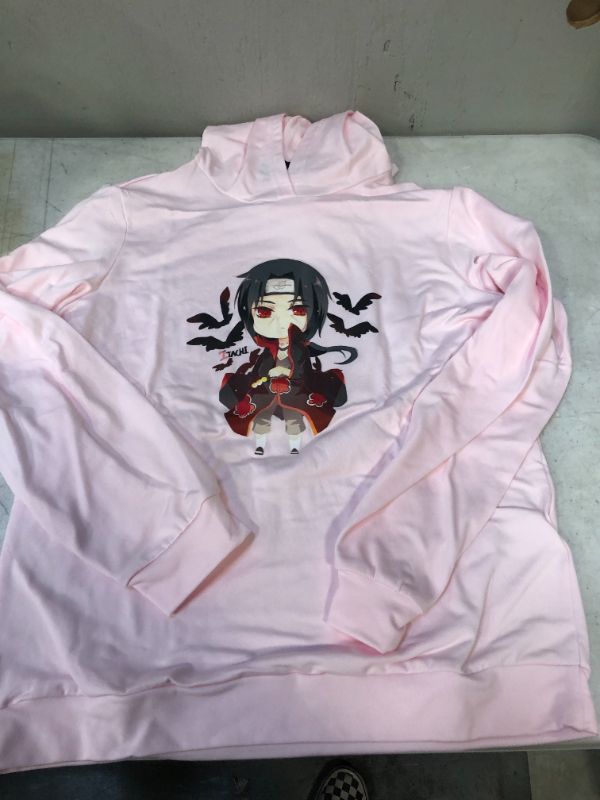 Photo 1 of GIRLS PINK HOODIE WITH ANIME PRINT MARKED SIZE 150 INTERNATIONAL/ 12 U.S.