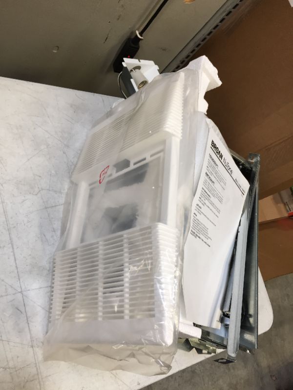 Photo 1 of Broan-NuTone 80 CFM Ceiling Bathroom Exhaust Fan with Light and 1300-Watt Heater