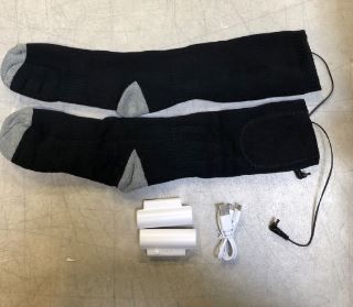 Photo 1 of  Heated Socks USB Heated Rechargeable  7/8 size --batteries included 