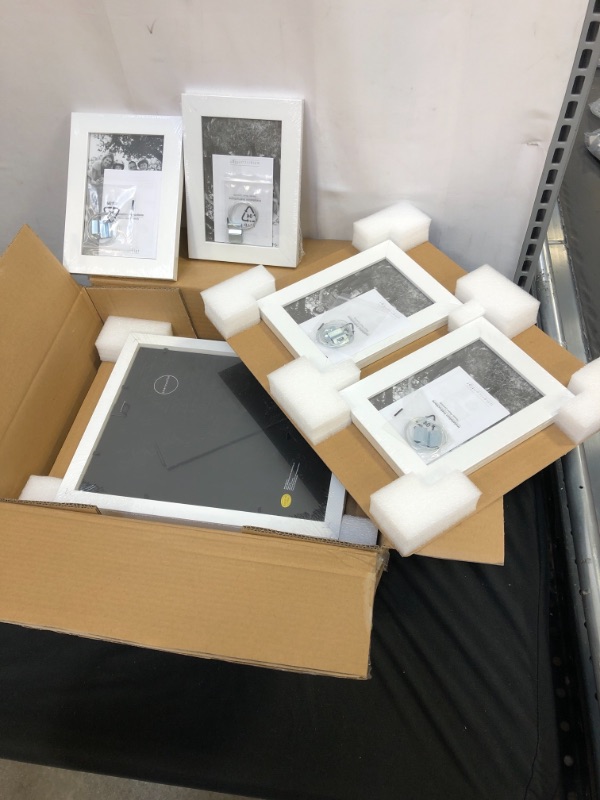 Photo 1 of Americanflat 10 Piece White Gallery Wall Picture Frame Set in 8x10, 5x7, and 4x6 - Composite Wood with Shatter Resistant Glass - Horizontal and Vertical Formats for Wall and Tabletop
