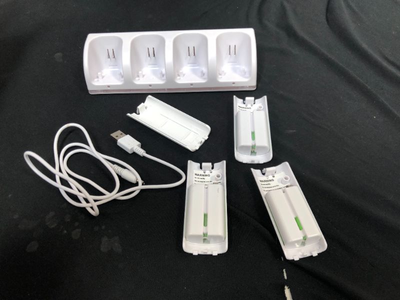 Photo 2 of 4-in-1 Charging Station for Wii&Wii U Remote Controller,Charger with 4 Rechargeable Battery Packs (4 Port Charging Station+4 pcs 2800mAh Replacement Batteries+USB Cable),Remote Not Included
