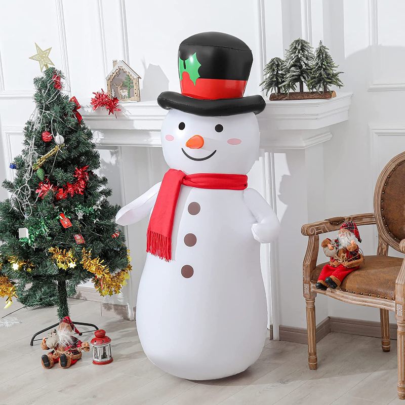 Photo 1 of Christmas Inflatable Decoration Outdoor & Indoor 5 FT, Snowman Inflatable with Colourful Light & Scarf, Happy Design Beautiful Decoration for Frontdoor Living Room Garden Lawn
