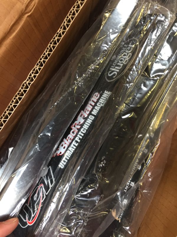 Photo 1 of Black Flame Ultimate Pitching Machine
