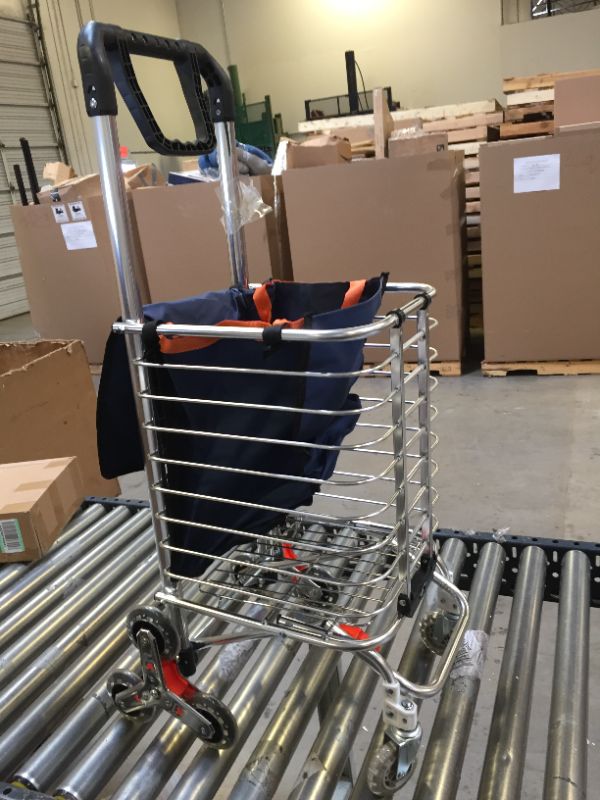 Photo 1 of 3 WHEEL TROLLEY SHOPPING CART WITH BASKET.