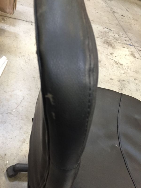 Photo 1 of 36 INCH TALL BLACK LEATHER CHAIR ON WHEELS.