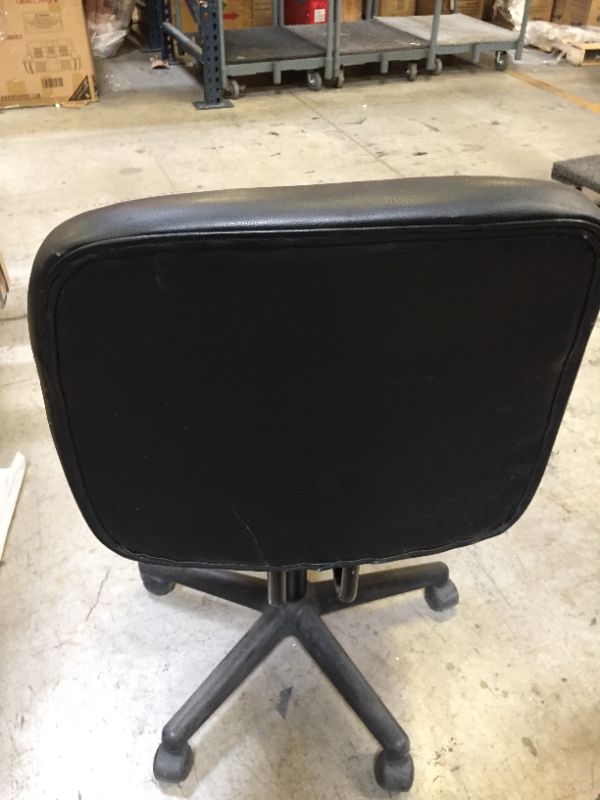 Photo 1 of 36 INCH TALL BLACK LEATHER CHAIR ON WHEELS.