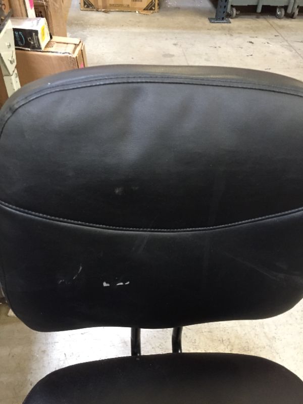 Photo 1 of 36 INCH TALL BLACK LEATHER CHAIR ON WHEELS.