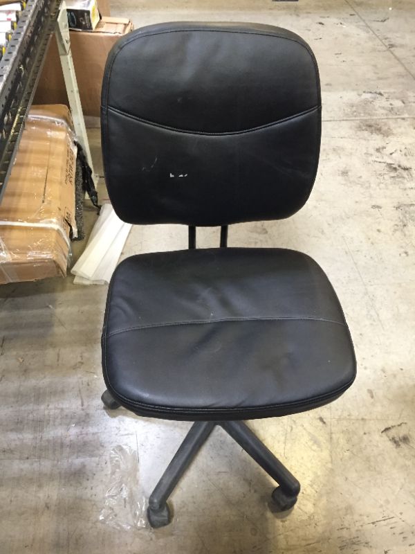 Photo 1 of 36 INCH TALL BLACK LEATHER CHAIR ON WHEELS.