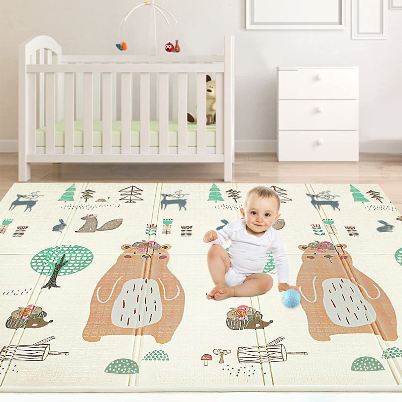 Photo 1 of UANLAUO Foldable Baby Play Mat, Extra Large Baby Crawling Mat, Waterproof Reversible Foam Playmat for Floor, Non-Toxic Kids Play Mats for Infants and Toddler with Portable Travel Bag (71 x 79inch)