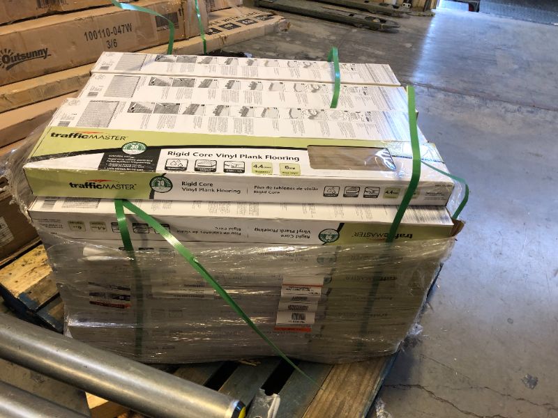 Photo 3 of **PALLET OF 32** TrafficMaster Edwards Oak 5.98 in. W Rigid Core Click Lock Luxury Vinyl Plank Flooring (23.95 sq. ft./case) 766.4 total square feet  