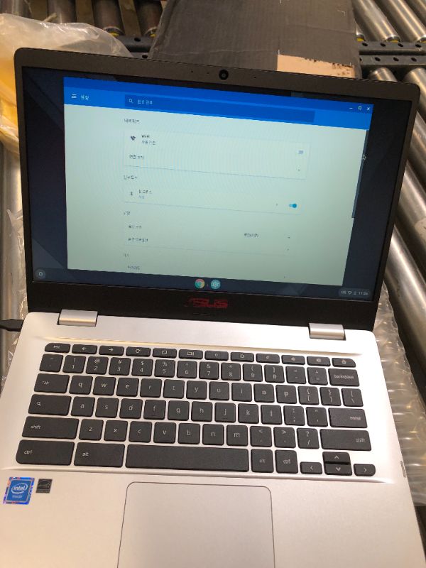 Photo 3 of ASUS Chromebook C423 14.0" 180 Degree HD NanoEdge Display, Intel Dual Core Celeron Processor, 4GB LPDDR4 RAM, 32GB Storage, Silver Color, C423NA-DH02 **READ CLERK COMMENTS** 
