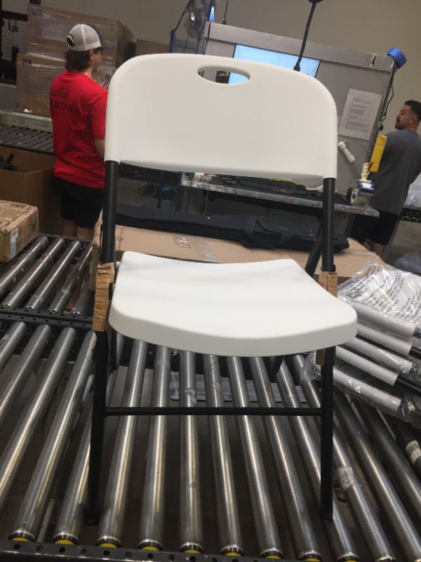 Photo 3 of Amazon Basics Folding Plastic Chair, 350-Pound Capacity, White, 6-Pack
