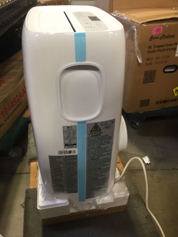 Photo 5 of 6,000 BTU (DOE) 115-Volt Portable Air Conditioner with Dehumidifier Function and LCD Remote in White **READ CLERK COMMENTS** 
