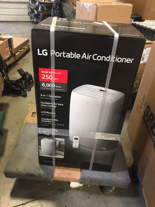 Photo 7 of 6,000 BTU (DOE) 115-Volt Portable Air Conditioner with Dehumidifier Function and LCD Remote in White **READ CLERK COMMENTS** 