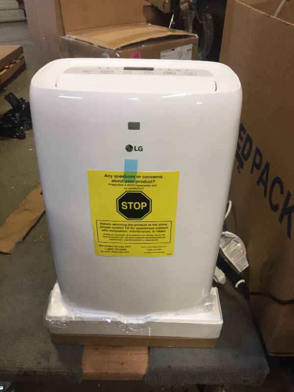 Photo 6 of 6,000 BTU (DOE) 115-Volt Portable Air Conditioner with Dehumidifier Function and LCD Remote in White **READ CLERK COMMENTS** 